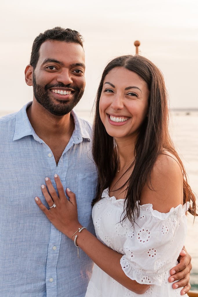 couple smiles after watch hill proposal