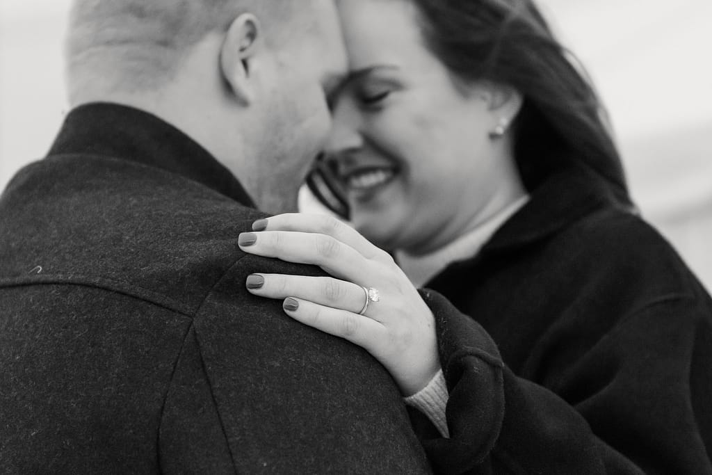 couple smiles after newport engagement