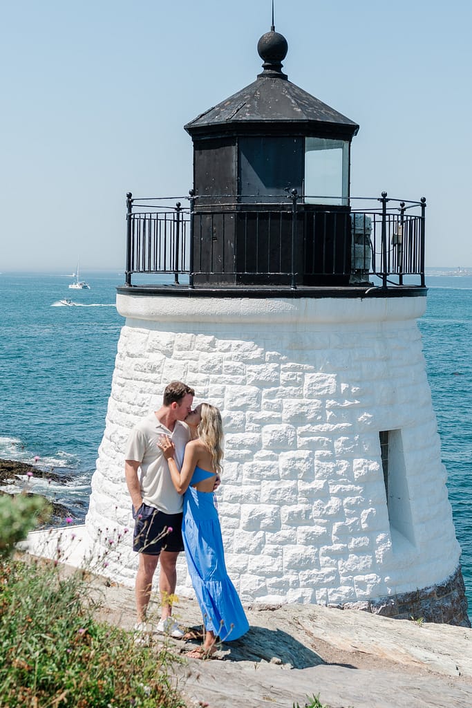 couple kisses at newport castle hill inn lighthouse