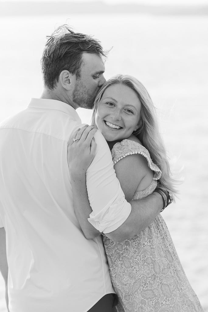 couple smiles at engagement in newport ri proposal