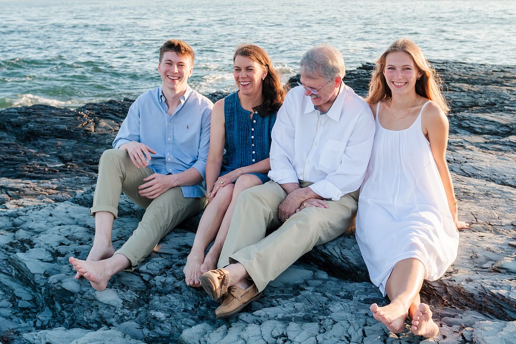 family poses for portraits in newport