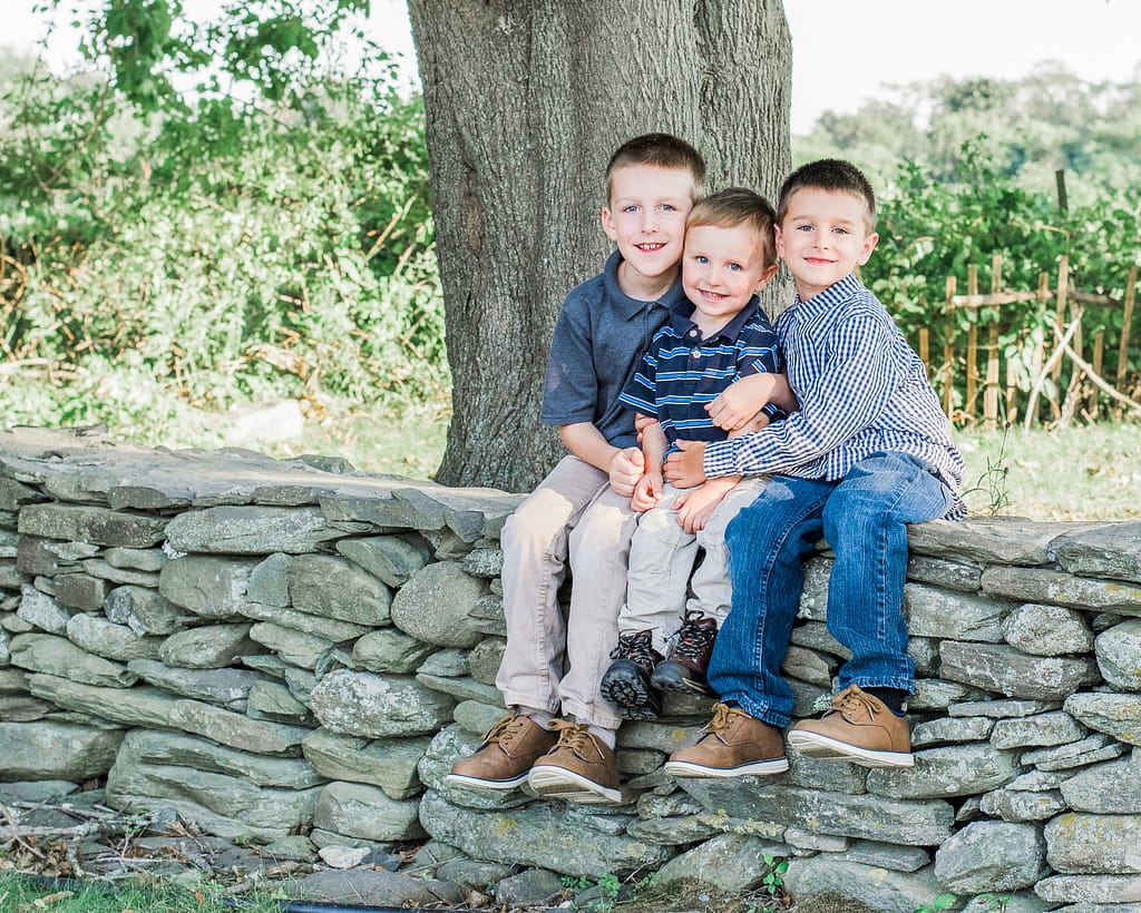 boys pose for family photographer in rhode island