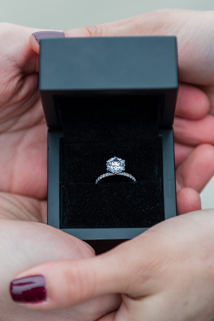 diamond engagement ring in a black box