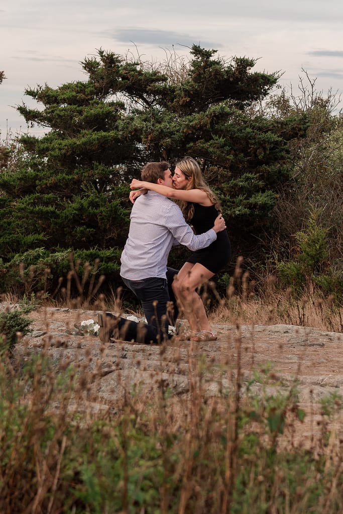 couple hugs after surprise proposal