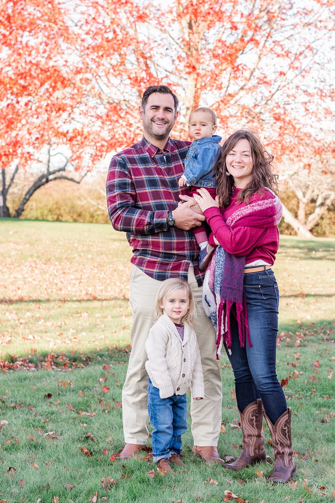 family poses for fall family portraits in rhode island